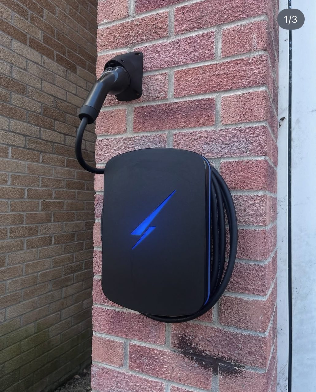 Hypervolt EV charger mounted on an exterior wall