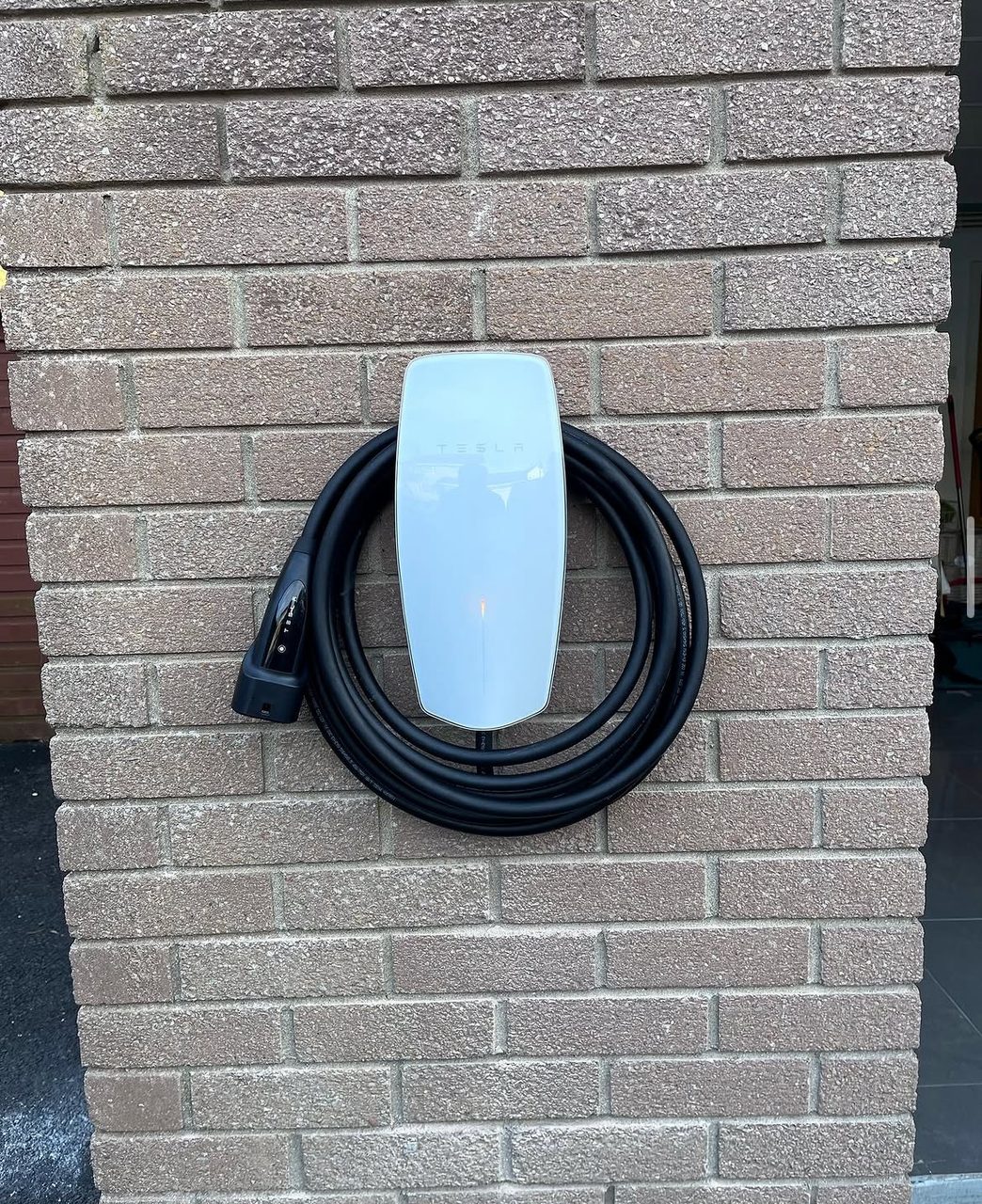 Tesla EV charger installed on a home