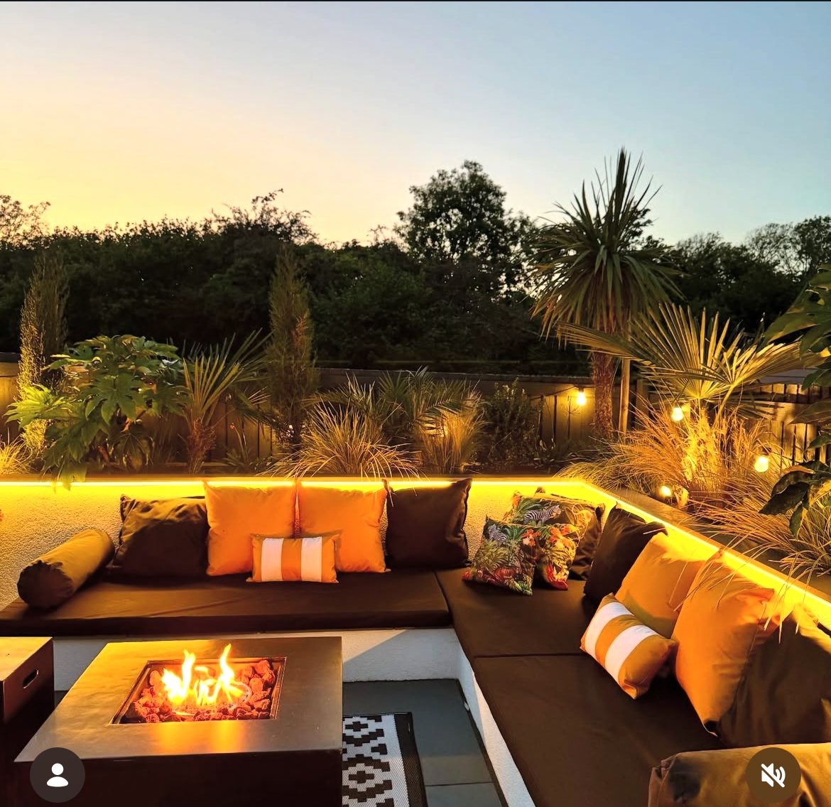Garden lighting installed along a patio area