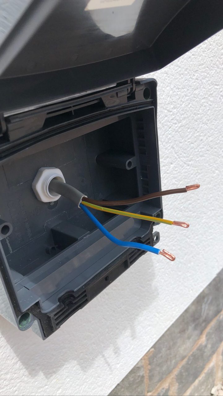 Outdoor socket installation in progress